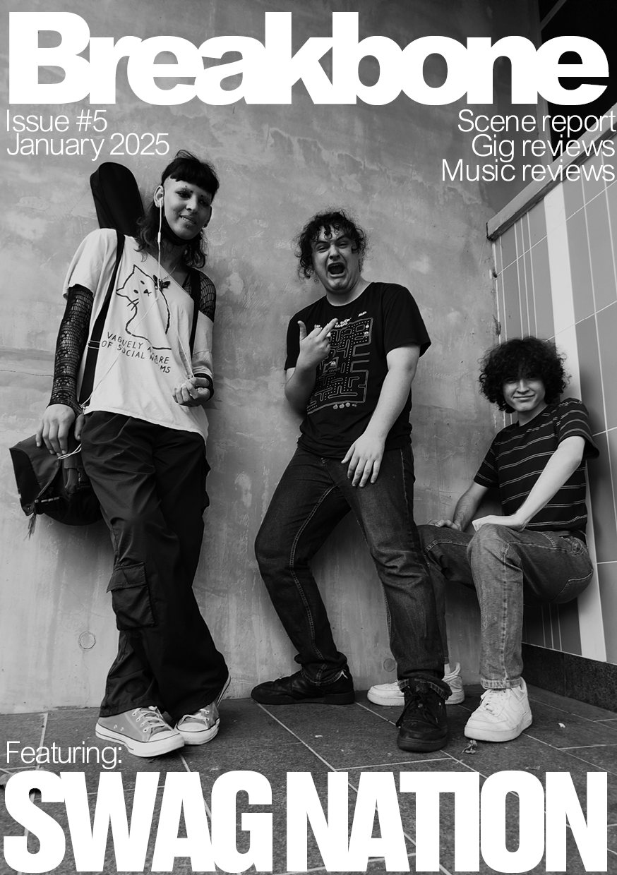 The Breakbone masthead over a black and white photo of three young people posing against a concrete wall, 'Issue